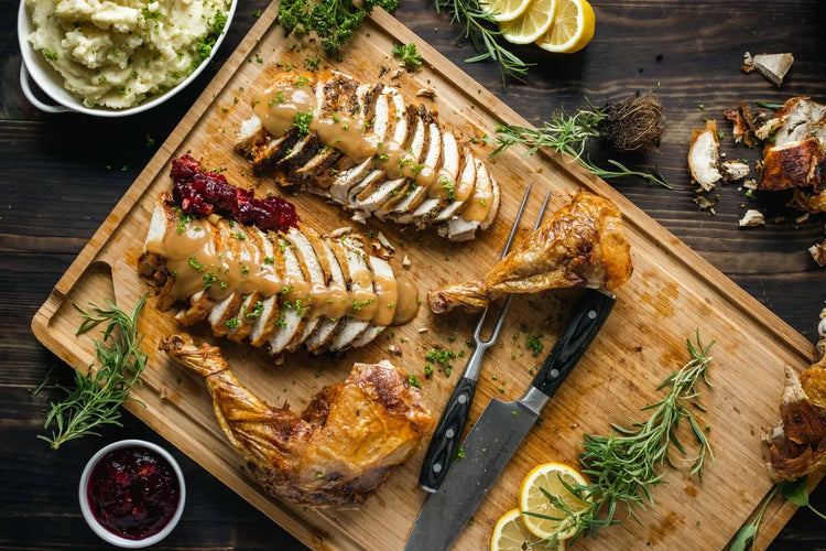 Cutting board with turkey slices