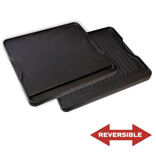 The Camp Chef Griddles 14 is a reversible black pan with one smooth side like a Flat Top Griddle and one ridged side for grilling, shown by a red double-headed arrow below to highlight its versatile design.