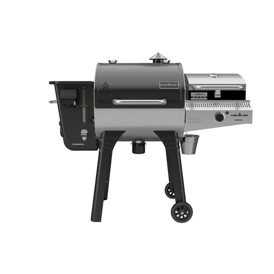 The Camp Chef Woodwind 24 is a black and silver outdoor pellet grill featuring a WIFI controller, side attachment, chimney, control panel, and two wheels for easy mobility, displayed on a white background.