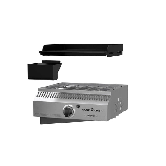 The Camp Chef Sidekicks is a stainless steel pellet grill accessory with a black griddle plate, grease cup, and powerful propane burner, shown above the grill unit against a white background.