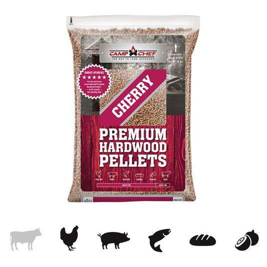 A bag of Camp Chef Hardwood Pellets with icons for beef, chicken, pork, fish, bread, and vegetables. Adds rich smoke flavor to your food. The brown bag features a red and white label.