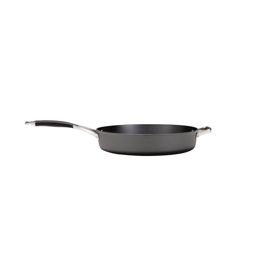 The Camp Chef Heritage Skillets is a black nonstick frying pan with a long handle and a small helper handle, designed for excellent searing, displayed against a plain white background.