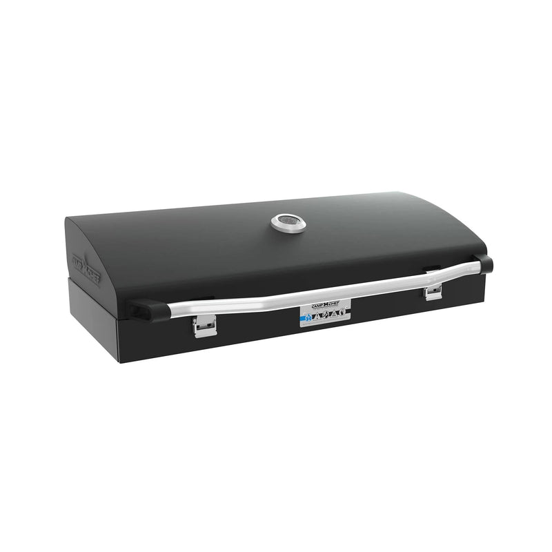 Load image into Gallery viewer, The Camp Chef BBQ Grill Box 14 - 2 Burner is a black rectangular portable grill smoker with a cast iron grate, curved lid, silver handle, and built-in thermometer on top. Shown on a white background. Perfect for any Deluxe Barbecue Box setup.
