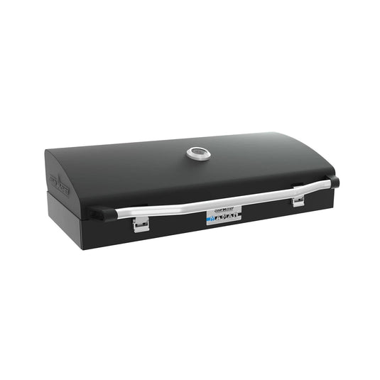 The Camp Chef BBQ Grill Box 14 - 2 Burner is a black rectangular portable grill smoker with a cast iron grate, curved lid, silver handle, and built-in thermometer on top. Shown on a white background. Perfect for any Deluxe Barbecue Box setup.