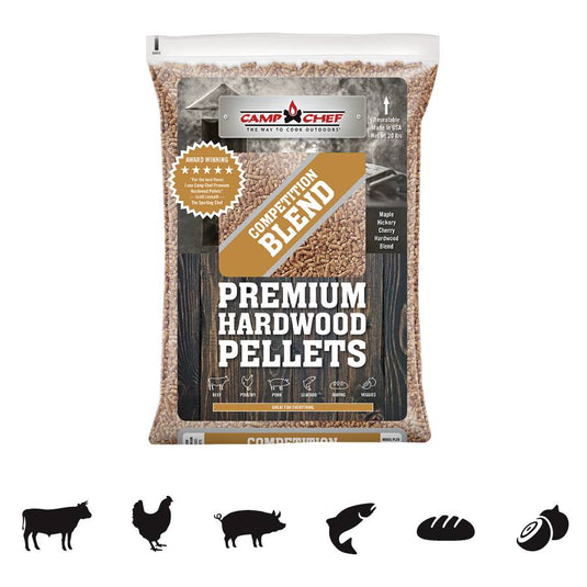 A bag of Camp Chef Hardwood Pellets features award badges and icons for beef, poultry, pork, fish, bread, and vegetables—highlighting its versatile grilling and smoking performance.