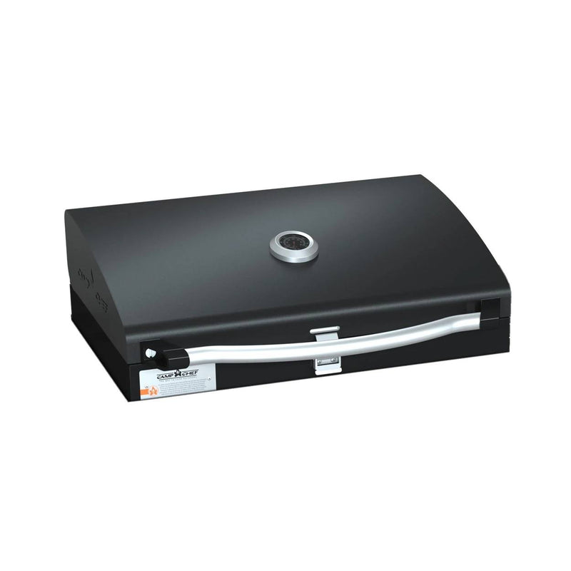 Load image into Gallery viewer, The Camp Chef BBQ Grill Boxes 16 is a black tabletop grill featuring cast iron grates, a curved silver handle, a built-in temperature gauge on the lid, and a front latch, shown against a white background. Black
