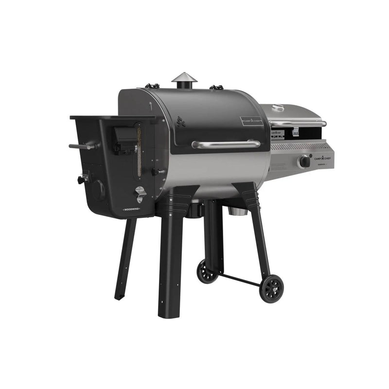 Load image into Gallery viewer, The Camp Chef Woodwind 24 is a black and silver outdoor pellet grill and smoker with a WIFI controller, chimney, control panel, side shelf, and sturdy wheeled legs for easy portability.
