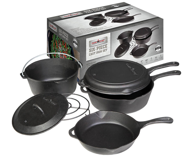 Load image into Gallery viewer, The Camp Chef 6-Piece Cast Iron Set, in classic black, includes a Dutch oven with lid, grill, and two skillets. Sturdy and pre-seasoned, the heavy-duty cookware is shown in front of its packaging box.
