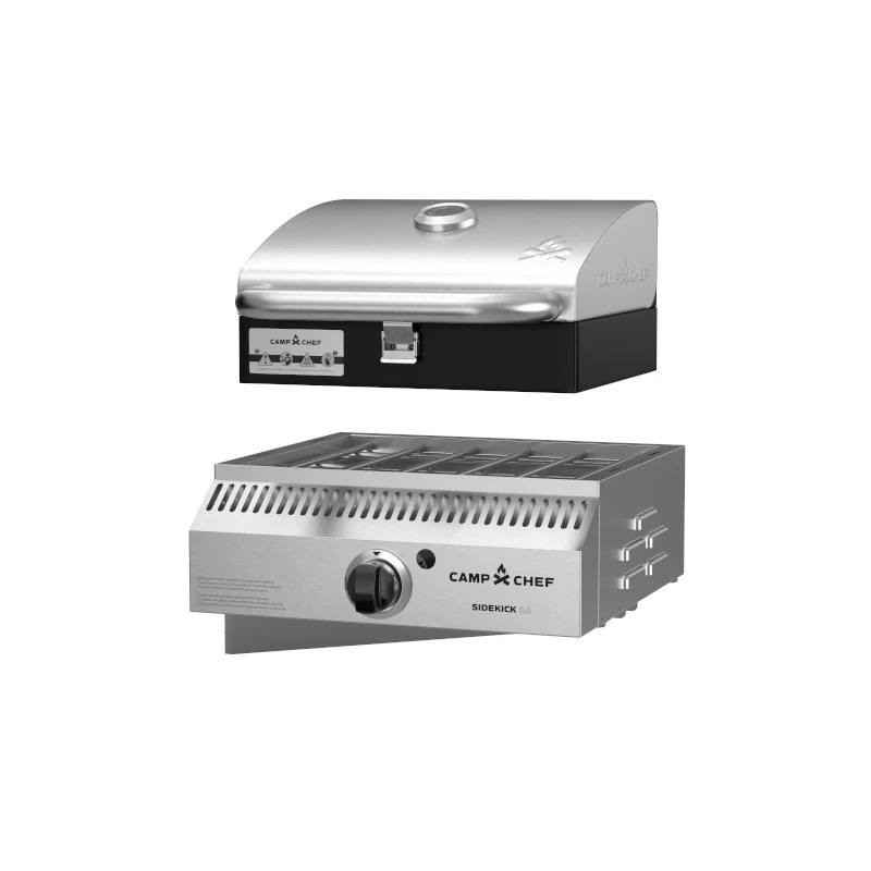Load image into Gallery viewer, Two Camp Chef BBQ Grill Boxes 14 grilling appliances—a compact, silver and black Professional Grill Box with a cast iron grilling surface on top, and a stainless steel sidekick burner with control knob below—are shown on a white background.
