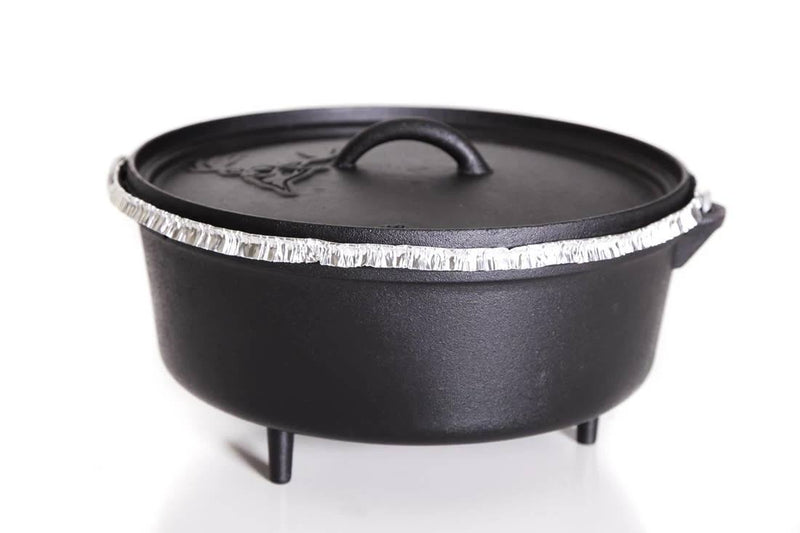 Load image into Gallery viewer, A deep Dutch oven with three short legs and a fitted lid, lined with a Camp Chef Disposable Dutch Oven Liner, sits against a white background—ideal for mess-free Dutch oven cooking.
