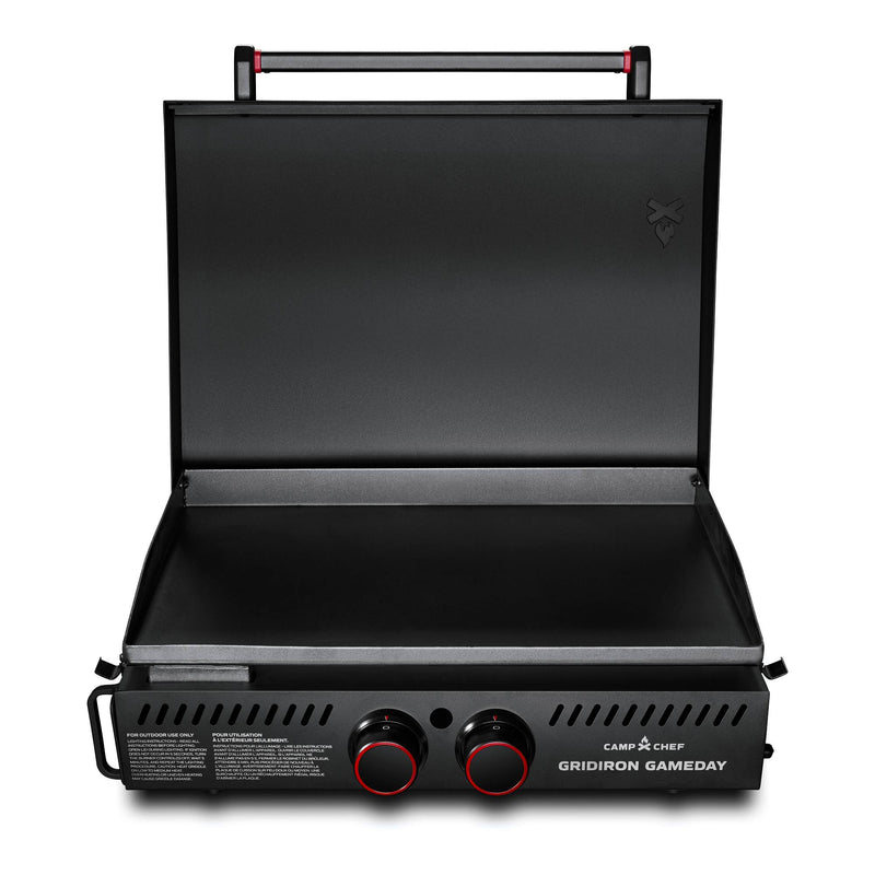 Load image into Gallery viewer, The Camp Chef Gridiron Gameday is a black portable griddle with an open lid, two front control knobs, and a spacious cooking surface—ideal for outdoor cooking or tailgating.
