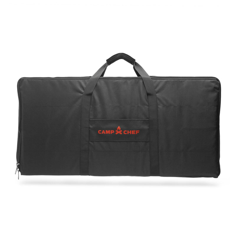Load image into Gallery viewer, The Camp Chef Carry Bag 14 is a large black bag with handles and a front pocket, designed for 2-burner systems, featuring the red Camp Chef logo in the center.
