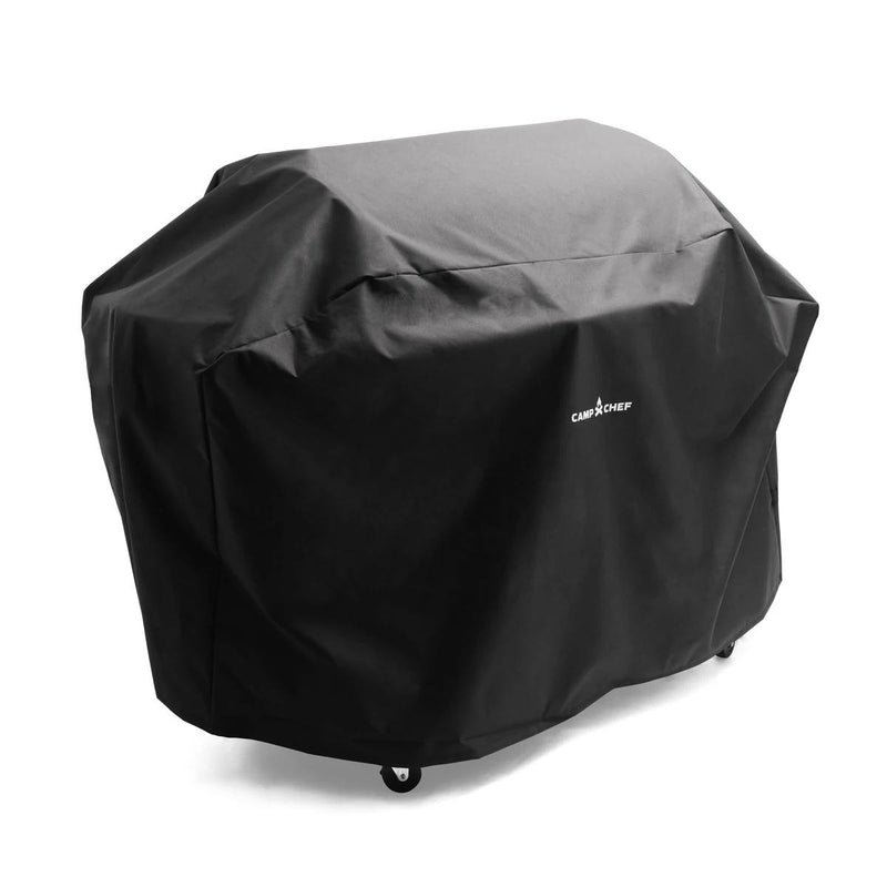 Load image into Gallery viewer, A Camp Chef Woodwind Pro Covers grill cover in black, featuring the Camp Chef logo, fits over a wheeled outdoor barbecue grill and is shown against a plain white background.
