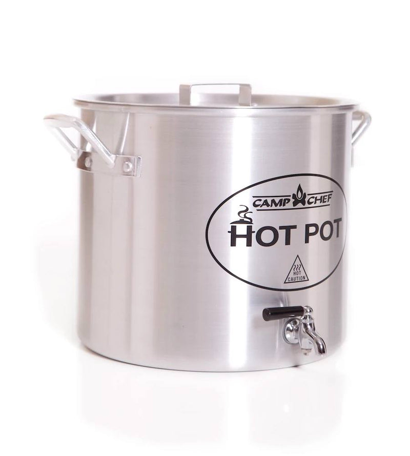 Load image into Gallery viewer, The Camp Chef Hot Water Pot is a large stainless steel pot with lid, side handles, and bottom spigot—ideal as an outdoor beverage dispenser for campsite hot drinks. "Camp Chef" branding is displayed on the front.

