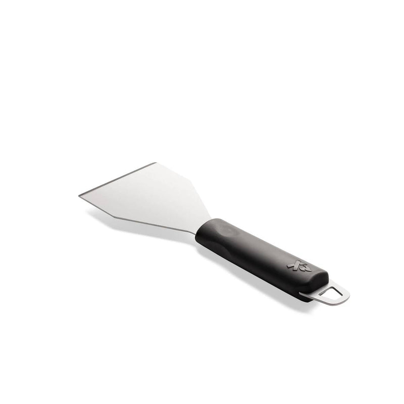 Load image into Gallery viewer, The Camp Chef Griddle Scraper features a wide stainless steel blade and black handle, perfect for cleaning your flat top grill. A metal loop at the handle’s end allows hanging. Shown on a white background.
