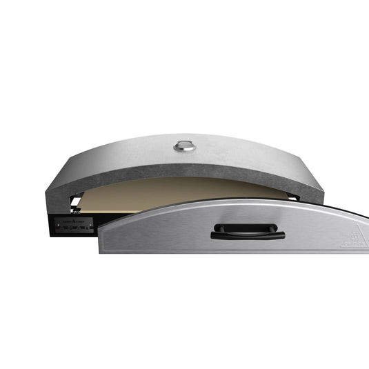 The Camp Chef Artisan Pizza Ovens 14 features a stainless steel build, curved top, and front handle. Its partially open design reveals an interior ceramic stone, perfect for making delicious pizzas outdoors.