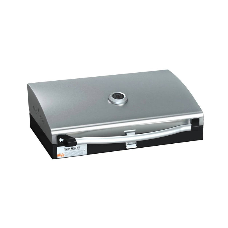 Load image into Gallery viewer, The Camp Chef BBQ Grill Boxes 16, a stainless steel tabletop gas grill with cast iron grates, heat diffuser, lid thermometer, curved handle, and front buckle latch is displayed on a white background. Stainless
