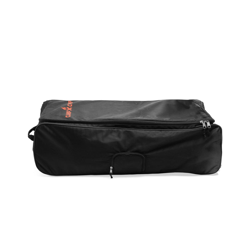 Load image into Gallery viewer, The Camp Chef Stove System Roller Bag is a large, rectangular black heavy-duty carry bag with a front handle and orange text in the top left corner. It features a partially open zipper and is shown lying flat on a white background.
