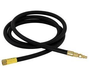 The Camp Chef RV connection hose is a coiled black rubber hose with brass fittings, featuring an RV quick disconnect on one end and a yellow-labeled cap on the other.