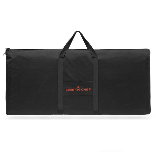 The Camp Chef Griddle Bag 16 - 3 Burner is a large black carry bag with two handles, a weather-resistant liner, and the red Camp Chef logo on the front pocket—ideal for transporting your Camp Chef griddle.