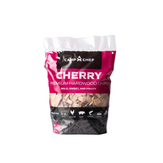 Camp Chef Wood Chips come in pink and black packaging labeled as mild, sweet, and fruity, with icons showing they're great for beef, poultry, pork, and fish.