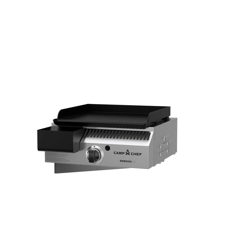 Load image into Gallery viewer, The Camp Chef Sidekicks is a stainless steel propane burner accessory with a black griddle, front control knob, and igniter button, designed for pellet grills. Shown on a white background.
