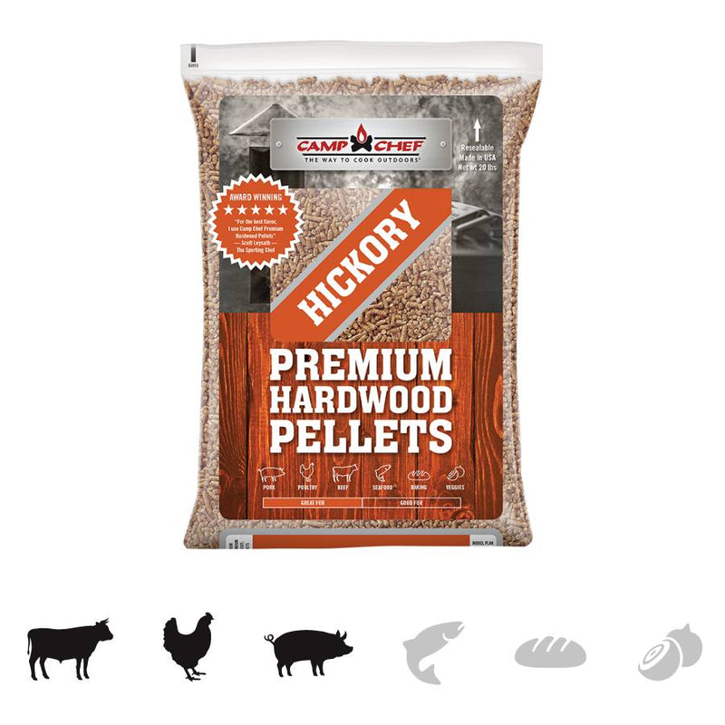 Load image into Gallery viewer, Camp Chef Hardwood Pellets, in a bag with an orange label and icons for beef, chicken, pork, fish, bread, and cheese, deliver a smoky flavor—ideal for giving your grilling a competition blend touch.
